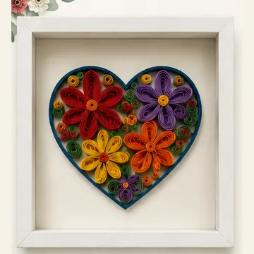 Corazón con flores de colores en quilling